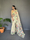 Off white color linen silk saree with woven design