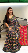 Black color muslin silk saree with patola printed work