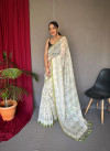 Off white and mahendi green color soft cotton saree with digital printed work