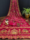 Rani pink color pure hand bandhej silk saree with zari weaving work