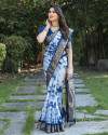 Navy blue color dola silk saree with shibori printed work