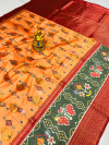 Orange color soft organza silk saree with printed work