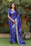 Violet color bandhej silk saree with zari weaving work