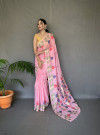 Baby pink color linen silk saree with woven design