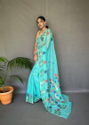 Sea green color linen silk saree with woven design