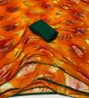 Orange color soft georgette saree with zari weaving work