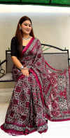 Magenta color muslin silk saree with patola printed work