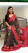 Black and red color muslin silk saree with patola printed work