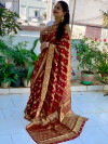 Maroon color soft bandhej silk saree with zari weaving work