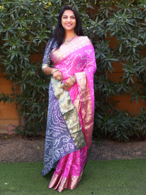 Baby pink color bandhani silk saree with hand bandhej work