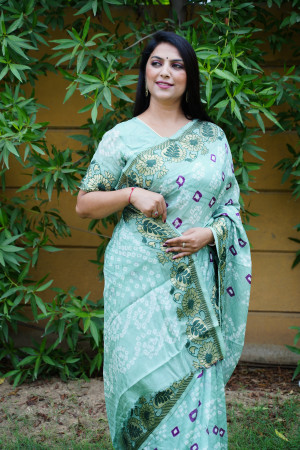 Sky blue color bandhej silk saree with zari weaving work