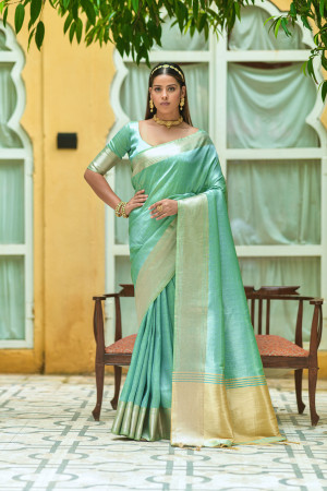 Sea green color soft linen silk saree with zari weaving work