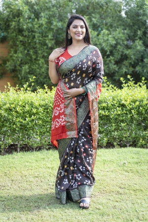 Black color bandhani silk saree with hand bandhej printed work