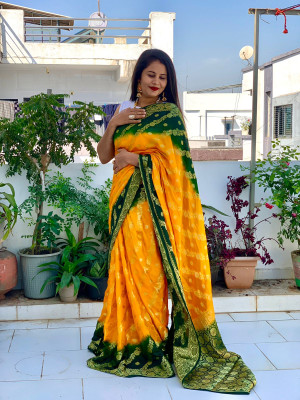 Yellow and green color soft bandhej silk saree with zari weaving work