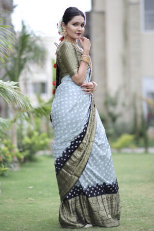 Gray color hand bandhej silk saree with zari weaving work