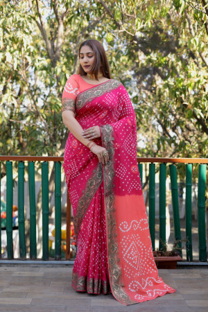 Rani pink color bandhej silk saree with printed work