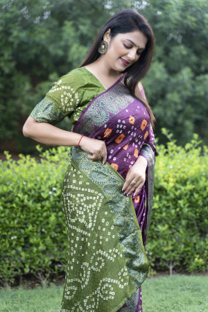 Magenta and mahendi green color bandhej silk saree with printed work