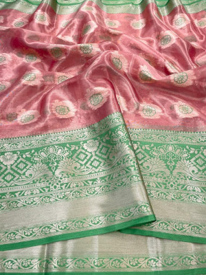 Pink color tissue silk saree with zari weaving work