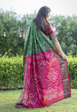 Green color bandhani silk saree with hand bandhej printed work