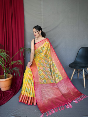 Yellow color tussar silk saree with zari weaving work