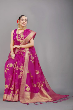 Rani pink color soft organza silk saree with woven design