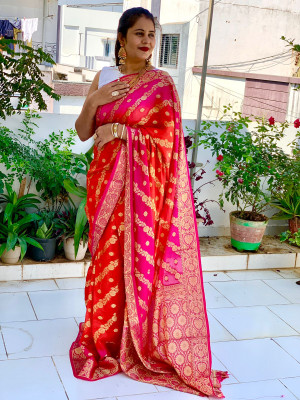 Maroon and rani pink color soft bandhej silk saree with zari weaving work