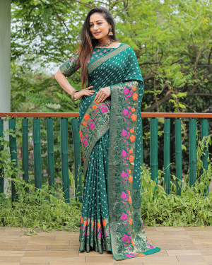 Bottle green color bandhej silk saree with woven design