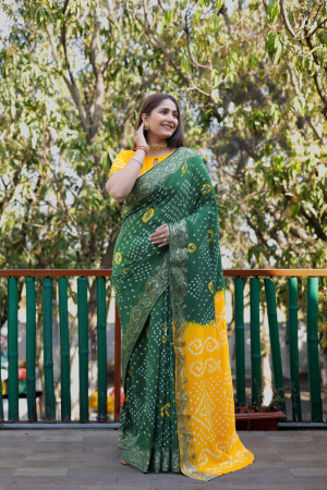 Green and yellow color bandhej silk saree with printed  work