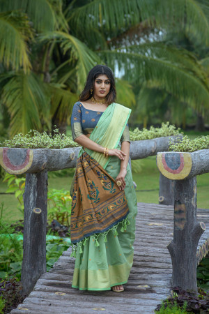 Pista green color chanderi silk saree with zari woven work