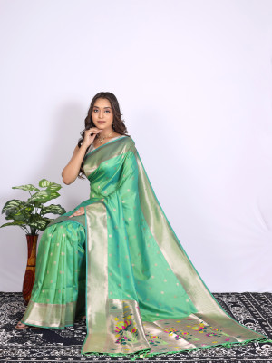 Sea green color paithani silk saree with zari  weaving work