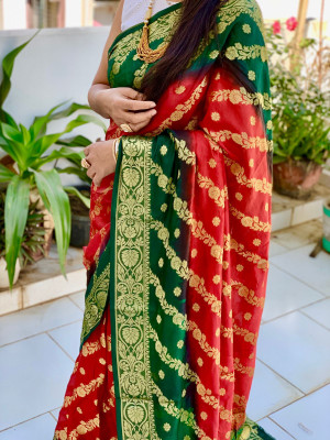 Red and bottle green color soft bandhej silk saree with zari weaving work