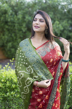 Red color bandhani silk saree with hand bandhej printed work