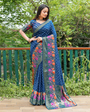 Rama green color bandhej silk saree with woven design