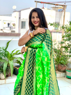 Parrot green and green color soft bandhej silk saree with zari weaving work