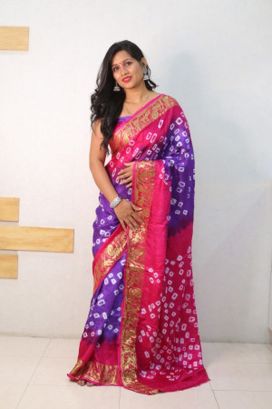Purple and pink color bandhej silk saree with zari weaving work