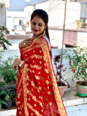Red color soft bandhej silk saree with zari weaving work
