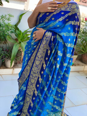 Firoji and navy blue color soft bandhej silk saree with zari weaving work