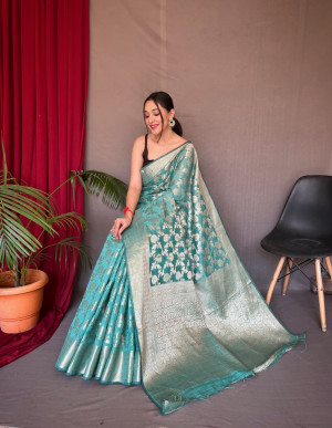 Rama green color linen silk saree with zari weaving work