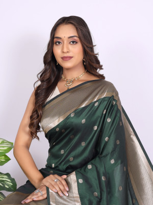 Dark green color paithani silk saree with zari  weaving work