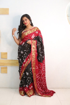 Black and red color bandhej silk saree with zari weaving work