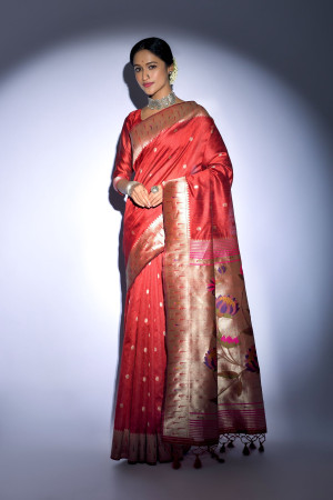 Red color tussar silk saree with zari weaving work