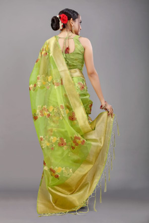 Parrot green color soft organza silk saree with woven design