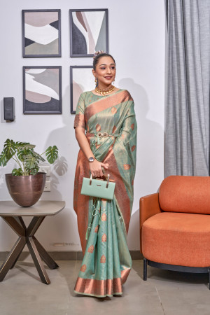 Rama green color tissue silk saree with zari weaving work