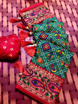Rama green color patola silk saree with printed work