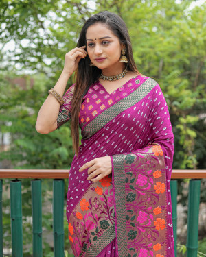 Magenta color bandhej silk saree with woven design