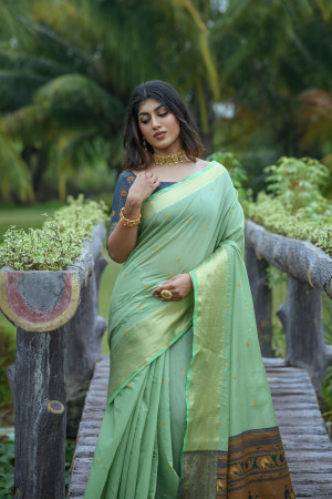 Pista green color chanderi silk saree with zari woven work