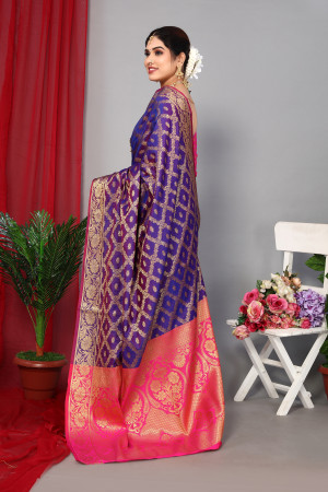 Violet color patola silk saree with zari weaving work