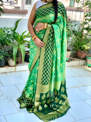 Pista green and dark green color soft bandhej silk saree with zari weaving work