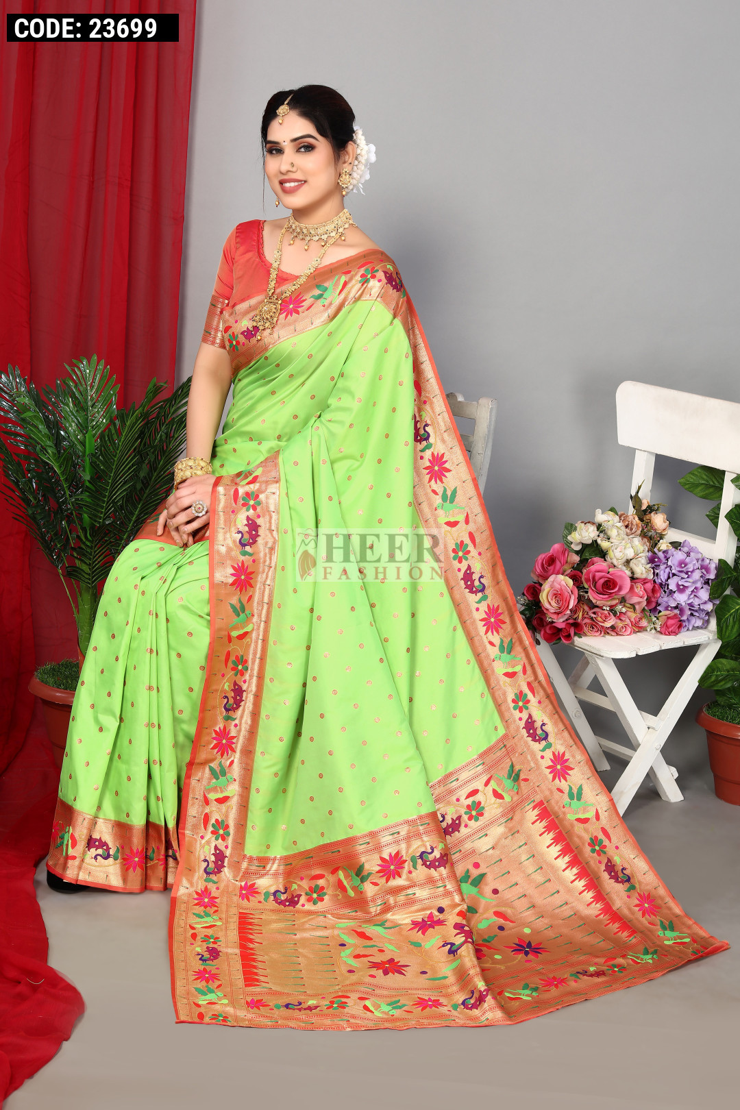 Parrot green color paithani silk saree with zari weaving work