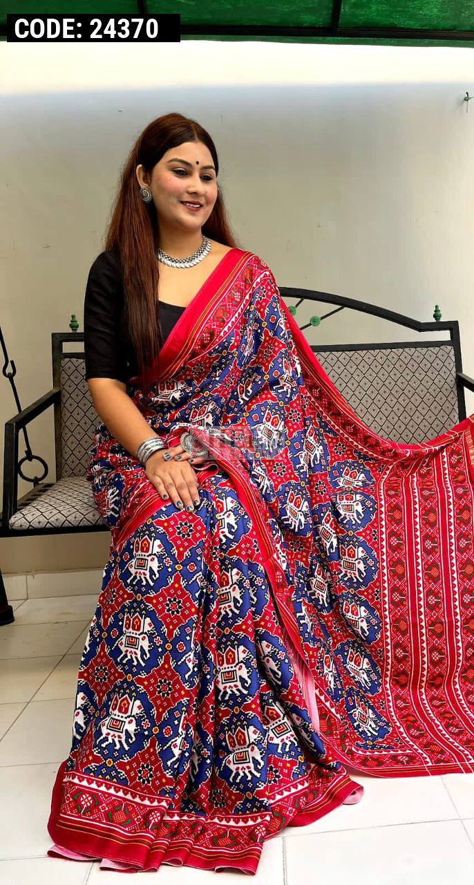 Royal blue color muslin silk saree with patola printed work
